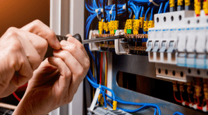 people handling electricity installation